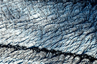 Glacier ice cracks from above
